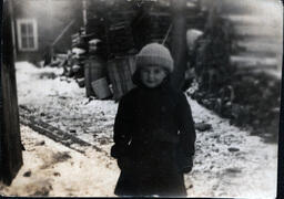 Young Boy in Trench Coat