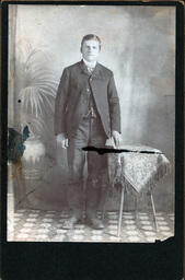 Young Man with Small Table