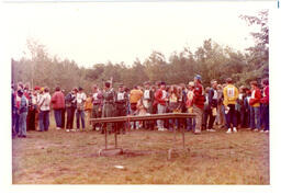 Competitors Waiting behind a Table (Part of the NMU Historic Photographs Collection)