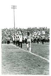 Back View of Marching Band Performing on Football Field (Part of the NMU Historic Photographs Collection)