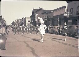 (016-012) Marching Band Performing Next to Mac's in Ontonagon Labor Day Parade