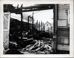 Fire Damage to Barn-Style Doors and Building Interior (1 of 2)