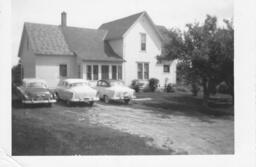 Jerry's, Ma's, and Andy's Cars by the House