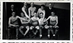 Legionaires Basketball Team Holding Hands