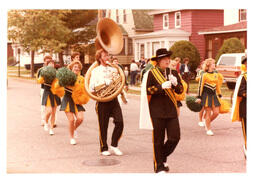 Marching Band and Cheerleaders Performing in Parade (Part of the NMU Historic Photographs Collection)