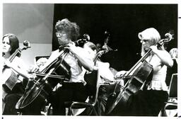 Cellists Performing on Stage (Part of the NMU Historic Photographs Collection)