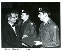 Roger Fraites Receiving Diploma from John X. Jamrich (Part of the NMU Historic Photographs Collection)