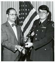 Eslinger and Jamrich Holding Cavalry Sword (Part of the NMU Historic Photographs Collection)