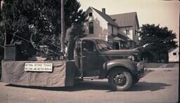 (008-043) National Defense Training Welding and Motor Repair Float in Ontonagon Fourth of July Parade