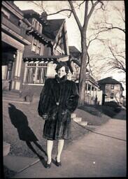 (039-001) Woman in Fur Coat on Sidewalk