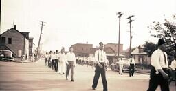 (005-008) Shriners Walking Down Residential Street (2 of 3)