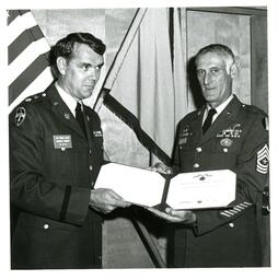 LTC Frank Allen and Unknown Man Holding Award (Part of the NMU Historic Photographs Collection)