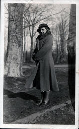 Woman in Coat and Hat