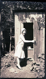 Woman and Outhouse