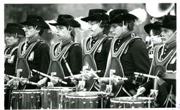 Line of Snare Drummers Playing in Marching Band (Part of the NMU Historic Photographs Collection)