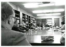 Group of People Eating at Conference Table (Part of the NMU Historic Photographs Collection)