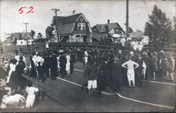 Spectators and Athletes Congregating on Track