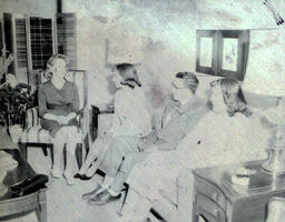 Presidents Reception for Graduating Seniors 1961: President and Three Women Sitting