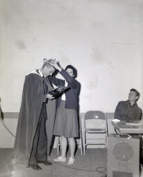 APO Ugly Man Contest--Winner: Stan Albeck, Students: Ray Clemo and Jay Holman 1961: Woman Crowning Winner Stan Albeck