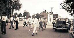 (005-005) Shriners and Other Men Walking Down Residential Street