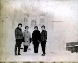 Queen Candidates--All-Events Weekend Feb. 23-25, 1961: Four Women Standing in Front of Snow Statue