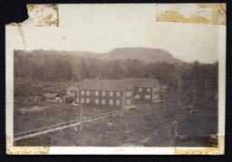 Two Buildings and Mountains