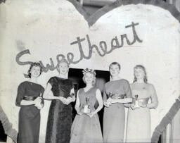 All Events Weekend 1959: Five Women Standing with Trophies in Front of "Sweetheart"