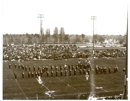 Early Marching Band Playing in Stationary Formation at Football Game (Part of the NMU Historic Photographs Collection)