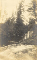 Man fishing at rapids