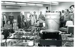 Large Group of People in Classroom Looking at Bucket (Part of the NMU Historic Photographs Collection)