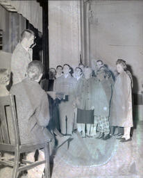 (622-05) Masquers--"Enemy of the People" 1959: Stained Photo of Crowd Looking at Man Speaking