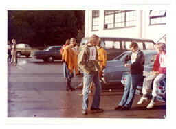 Group of People Chatting in Parking Lot (Part of the NMU Historic Photographs Collection)