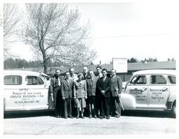 Group Shot of Students with Marquette High School and Northern Michigan College of Education Driver Training Cars (Part of the NMU Historic Photographs Collection)