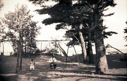 (007-011) Man and Boy on Swing Set