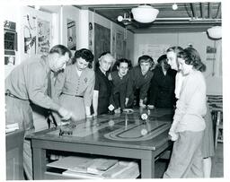 Instructor Showing Students a Model Road (Part of the NMU Historic Photographs Collection)