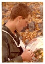 Competitor Looking at Crumpled Map (Part of the NMU Historic Photographs Collection)