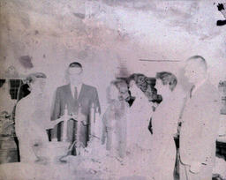 Presidents Reception for Graduating Seniors 1961: President with Five Women Standing by Candles