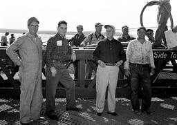 Construction Workers Standing on Mackinac Bridge