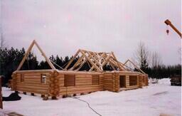 Koski Log Homes Multi-Cornered Log Home with Trusses