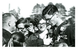 Man Clipping or Unclipping a Parachutist’s Parachute (Part of the NMU Historic Photographs Collection)