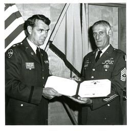 Lieutenant Frank Allen and Unknown Man Holding an Award (Part of the NMU Historic Photographs Collection)