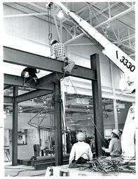 Men Bolting Beams Together (Part of the NMU Historic Photographs Collection)