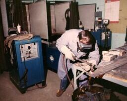 Man Welding Strip of Metal (Part of the NMU Historic Photographs Collection)