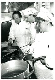 Man and Students Cooking on Stove (Part of the NMU Historic Photographs Collection)