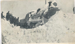 Crew Digging Engine out of Snow