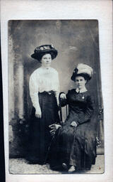 Two Women in Decorative Hats