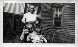 Young Tom Ross with Older Couple