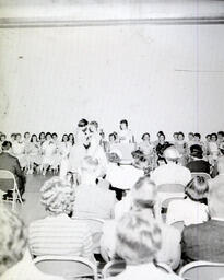 Rose Ceremony 1960: Rose Is Pinned On (Two Women Wearing White Dresses)