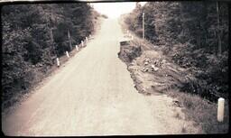 (024-010) Overhead View of Damaged Section of M-64