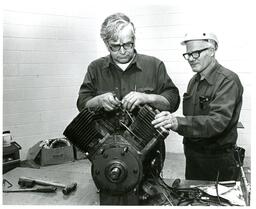 Two Men Working on Machine or Automotive Part (Part of the NMU Historic Photographs Collection)